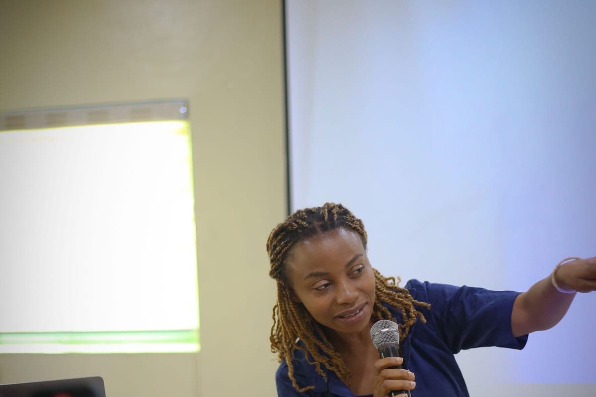 A facilitator leading an outreach session at the Sunflower Teens Summit